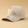 Detail of beige baseball cap with 3D colorful butterflies and shimmering rhinestones - One Size / Khaki