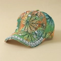 Detailed view of rhinestone embellished baseball cap with green and orange leaf pattern - One Size / Green