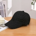 Detail of black baseball cap with fine mesh texture and white polka dots on wooden table - Adjustable / Black