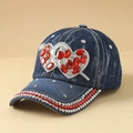 Detailed view of dark blue denim baseball cap with red rhinestone hearts and silver studs - Heart Dark Blue