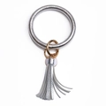Silver textured PU leather oversized ring keychain with golden clasp and tassel charm - Silver
