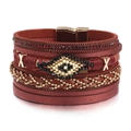Pulsera bohemia de cuero rojo multicapa con cadena dorada y detalle de ojo de cuentas - Rojo