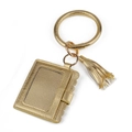 Detail of gold faux leather wristlet bangle with tassel and matching card holder keychain - Gold