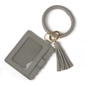 Detail of grey pebbled PU leather card holder set with gold ring and tassel charm - Gray