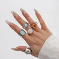 Mix of acrylic alloy rings in silver finish featuring sky blue and amber orange gemstones - Silver Tone Ring Set One