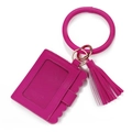 Detail of hot pink scalloped ID card holder with circular wristlet and tassel charm - Rose Red