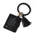 Detail of black pebble leather card holder with clear ID window and wristlet ring - Black