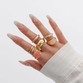 Set of 6 vintage gold alloy rings featuring translucent amber resin stones for stacking - Gold Ring Set Seven