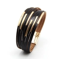 Multilayer black leather bracelet with golden metal tubes and magnetic clasp closure - Black