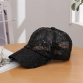 Breathable black lace baseball cap with shimmering sequins on a light wood tabletop - Black