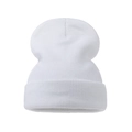 Close-up of white ribbed knit beanie featuring thick cuff and stretch texture - Adult / White