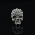 Vintage gothic skull ring with baroque engravings on black reflective surface - US 7 / Antique Silver
