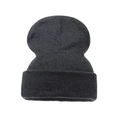 Detailed close-up showing the classic ribbed knit pattern of this dark grey winter beanie - Adult / Dark Heather Grey