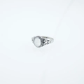 Vintage stainless steel ring with oval white gemstone and Celtic knot design details - US 7 / White Stone