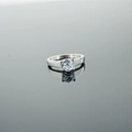 Classic men's silver solitaire ring with round moissanite stone in four-prong setting - US 5