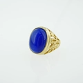 Bague vintage en or avec une grande pierre bleue ovale à effet œil-de-chat et filigrane - Bleu / Or