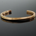 Brazalete abierto Mobius vintage de acero de titanio en bronce con grabados geométricos - Oro rosa