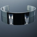 Polished silver stainless steel cuff bracelet with mirror finish on dark background - Men's (Large) / Silver