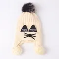 Winter cartoon cat knit hat for children with earflaps and large grey pom-poms - One Size / Beige