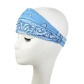 Detail view of light blue paisley pattern on wide elastic headband for women - Medium Blue