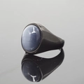 Minimalist gunmetal steel ring with a large oval grey-blue gemstone and cat-eye effect - US 7 / Black Base Gray Cat's Eye