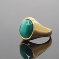 Polished gold stainless steel ring featuring a large oval green cat's eye stone inlay - US 7 / Gold Base Green Cat's Eye