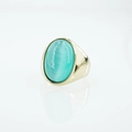 Anello in titanio dorato lucido con gemma occhio di gatto ovale blu chiaro - Taglia 7 / Blu Acqua (Tono Oro)