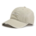 Detailed close-up of white 'Everyday' embroidery on washed cotton beige baseball cap - Off White / Adjustable