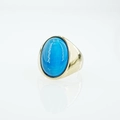 Anello da uomo in acciaio al titanio dorato con una grande pietra occhio di gatto blu - Taglia 7 / Azzurro (Tono Oro)