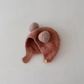Simpatico cappello invernale per neonati con paraorecchie, doppio pompon e pile marrone - 46-50cm (6 Mesi - 2 Anni) / caffè