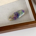 Detailed close-up of handmade oval marble-patterned hair clip with gold France engraving - Purple and Blue Gradient