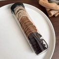 Detail of high-elastic spiral hair ties in brown tones inside a transparent cylinder tube - Light Coffee Gradient