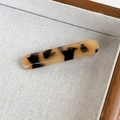 Close-up of tortoise shell acetate hair clip with gold France Handmade lettering - Light Tortoiseshell