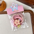 Detalle de un juego de gomas para el pelo de flor de cerezo rosa y cuentas claras - Rosa(24856A)