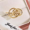Modern gold-plated interlocking multi-ring band jewelry in a premium pink gift box - Multi-Ring Intersecting Style (13333C)