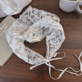 Detailed macro view of white floral lace embroidery on French retro triangle headscarf - Exuberant Flowers Pattern