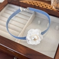 Close-up of denim choker with white lace flower and pearl inside a vintage wooden box - White Lace Small Flower Style / White Small Flower (25014A)