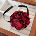 Detailed view of handmade deep red satin flower choker necklace in a wooden jewelry box - 18# Dark Red Satin Exaggerated Choker (24442B)