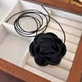 Macro detail of a 3D black satin handmade rose choker necklace in a wooden gift box - 23# Black Satin 3D Rose (24443C)