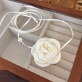 Macro shot of the handmade white fabric camellia flower choker with pearl detail - 29# White Fabric With Pearl (24624B)