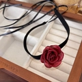 Close-up of handmade red fabric flower choker with black velvet ribbon on a jewelry box - 33# Dark Red Silk Look Choker (24859B)