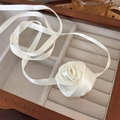 Detailed macro view of a creamy white satin rose choker featuring delicate fabric petals - 35# Cream White Satin Rose Ribbon (24860A)