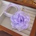Detailed macro view of a light purple mesh flower choker with pearlescent shimmering petals - 44# Light Purple Sheer Pearly Flower (24874B)