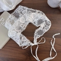 Close-up of white French vintage lace bandana with floral embroidery and scalloped edges - Boston Ivy Pattern
