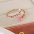 Detail of rose gold open ring with pink gemstone and micro-set zircon leaf design - Pink Zircon Foliage Style(25097A)