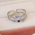 Detail view of double-layer silver ring with purple and blue marquise-cut zircons - Three Zircon Five Flower Three Leaf Style(25102B)