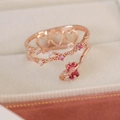 Detail of rose gold adjustable double layer ring with micro-set heart stones and zircons - Pink Zircon Three Heart Style(25104A)