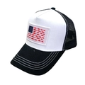 Black and white trucker hat with USA flag fish patch and breathable mesh back - White