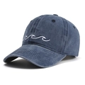 Detailed view of wave pattern 3D embroidery on washed cotton baseball cap fabric - One Size / Navy Blue