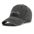 Detail of grey washed cotton baseball cap featuring white wave embroidery on front - One Size / Black